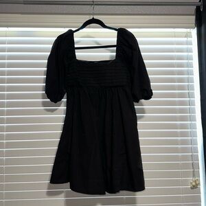 Black mini dress with poofy sleeves
